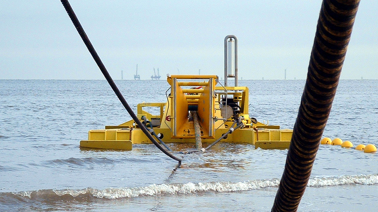 cable plough in sea with cable 