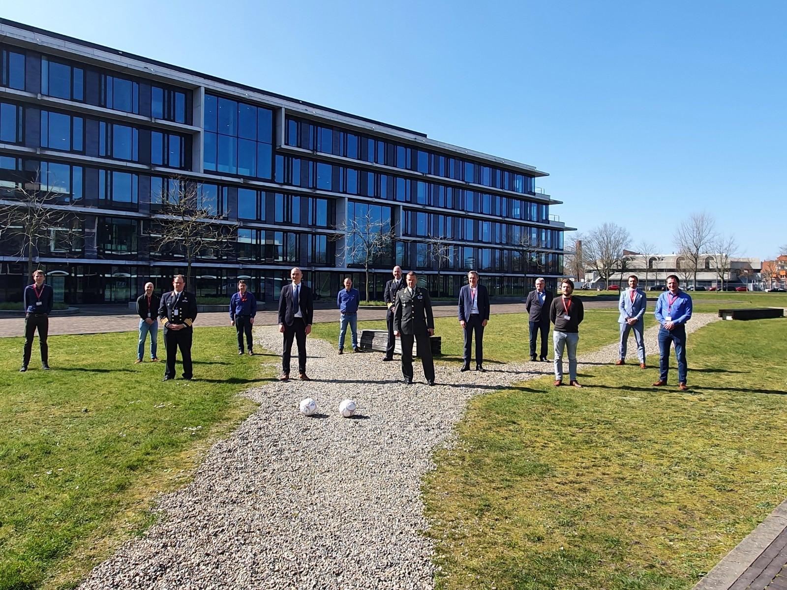 Group of people together after signing partnership for engineering capacity. 