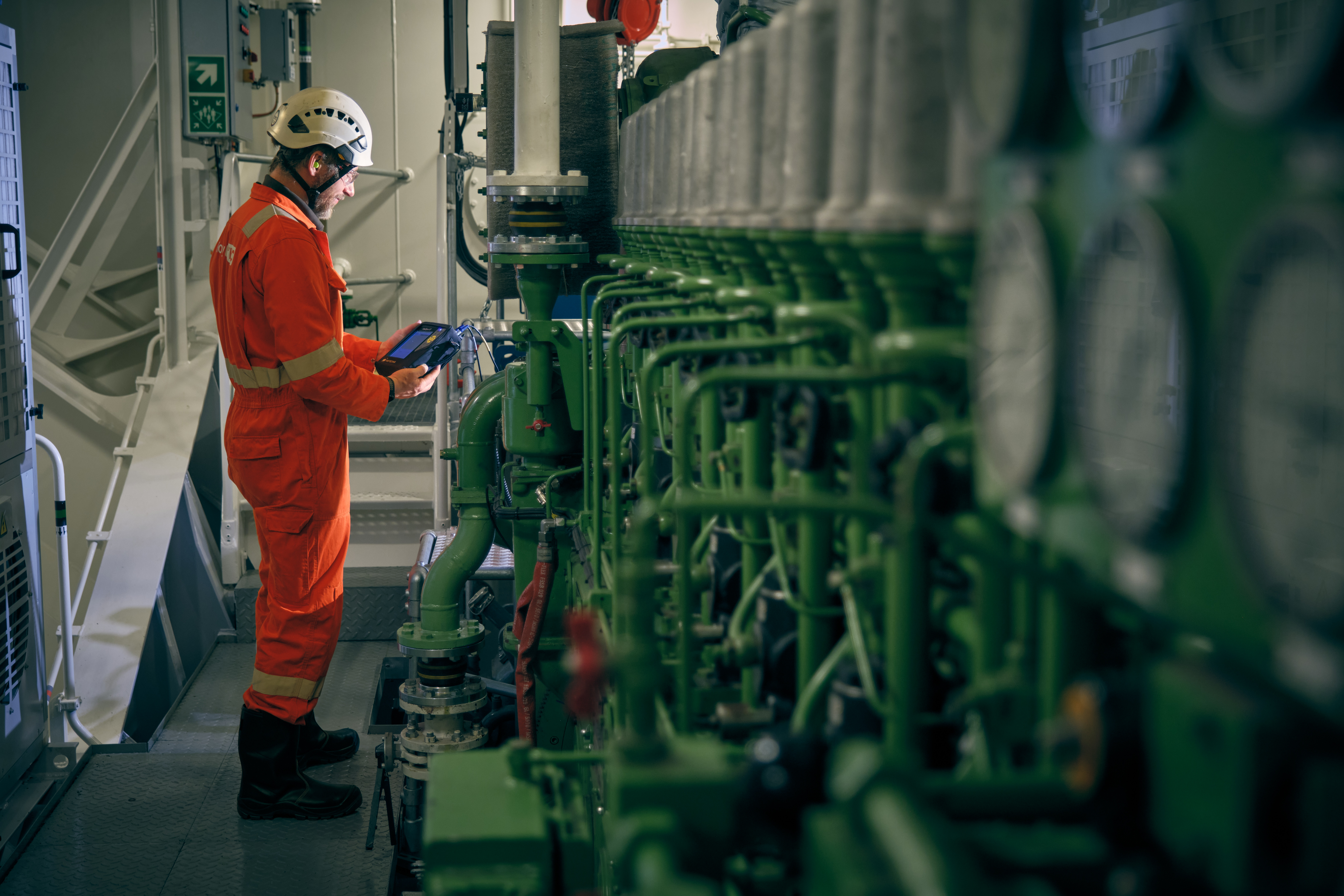 Specialist doing measurement on board