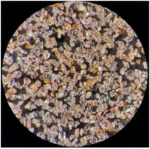 Fine garnet products under microscope