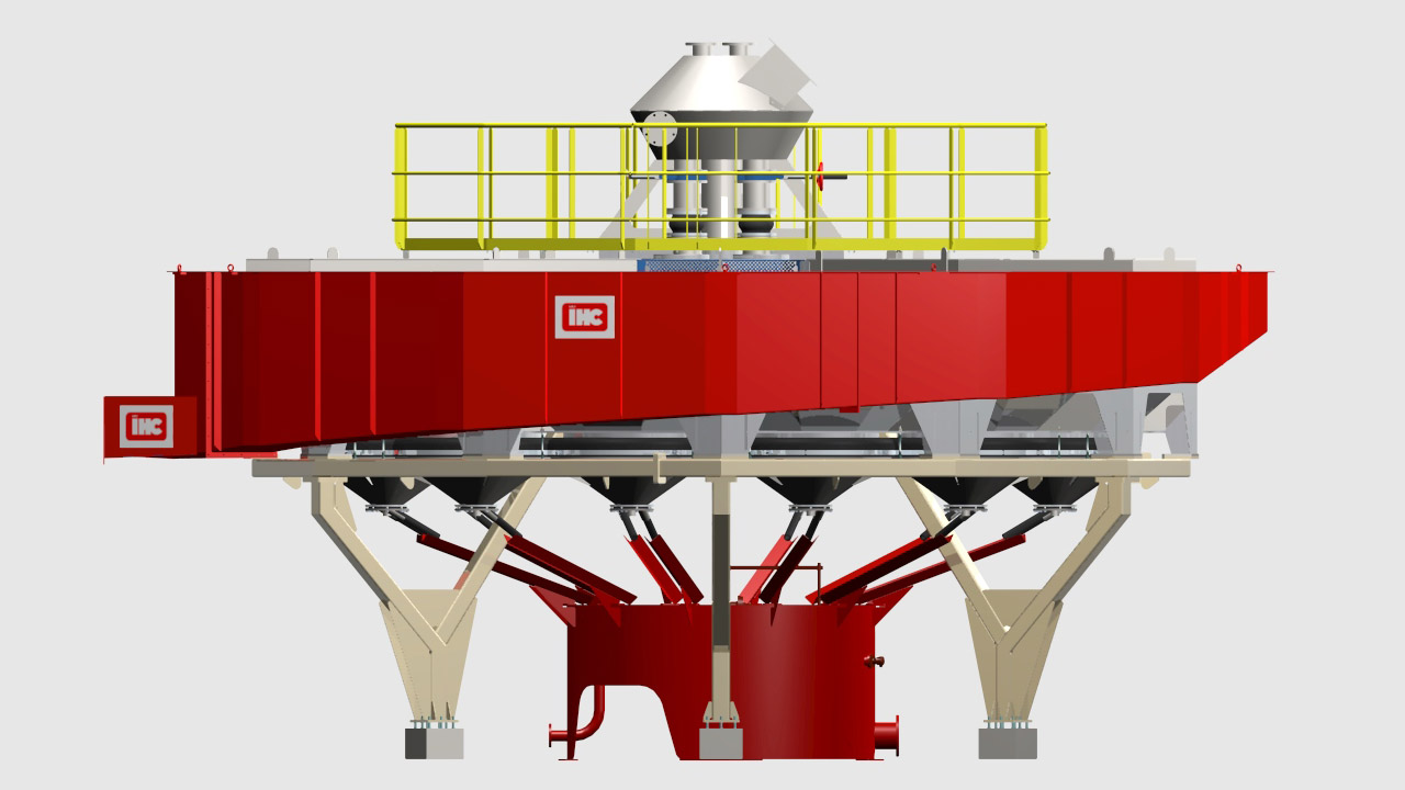 This picture shows a full circular jig design with central feed , circumferential tailing launder and concentrate tank in which the 12 jig modules discharge concentrate.