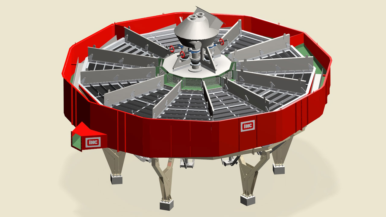 This picture shows a birds view of a full circular jig design with central feed , circumferential tailing launder and concentrate tank in which the 12 jig modules discharge concentrate.