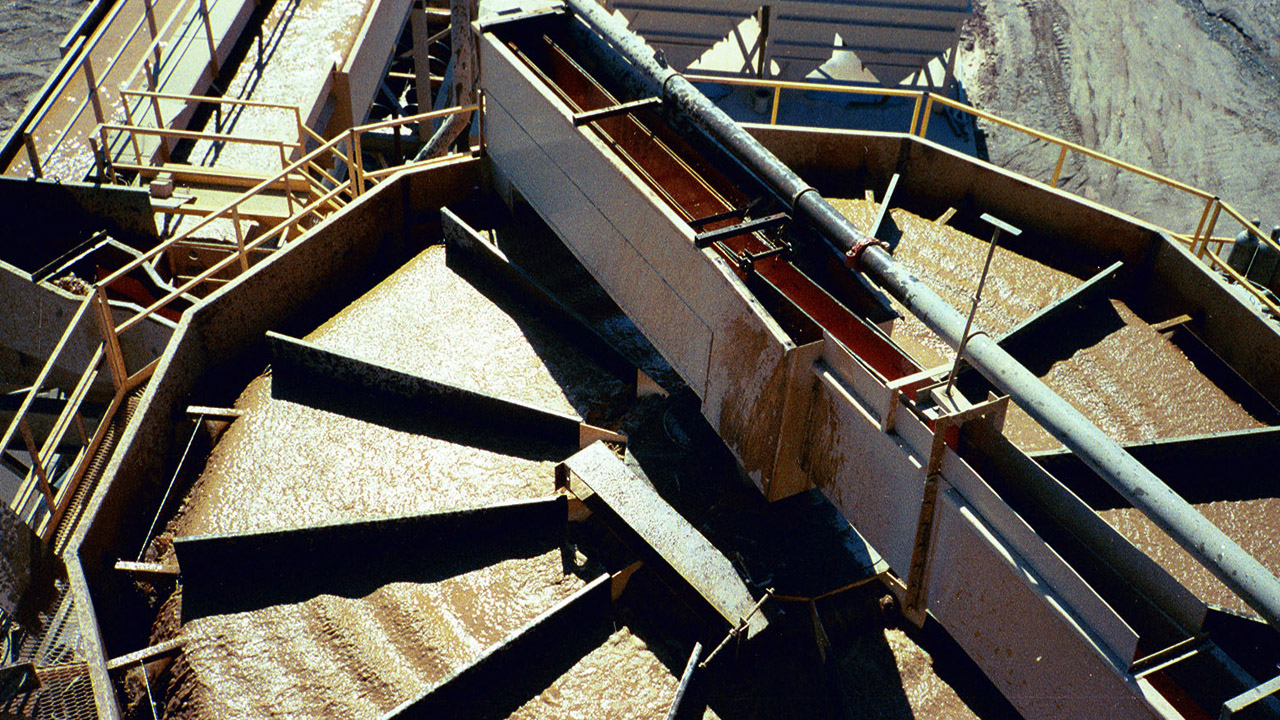 A full circular IHC Mining jig consisting of 12 module cells with central feed intake and trapezoidal bed shape