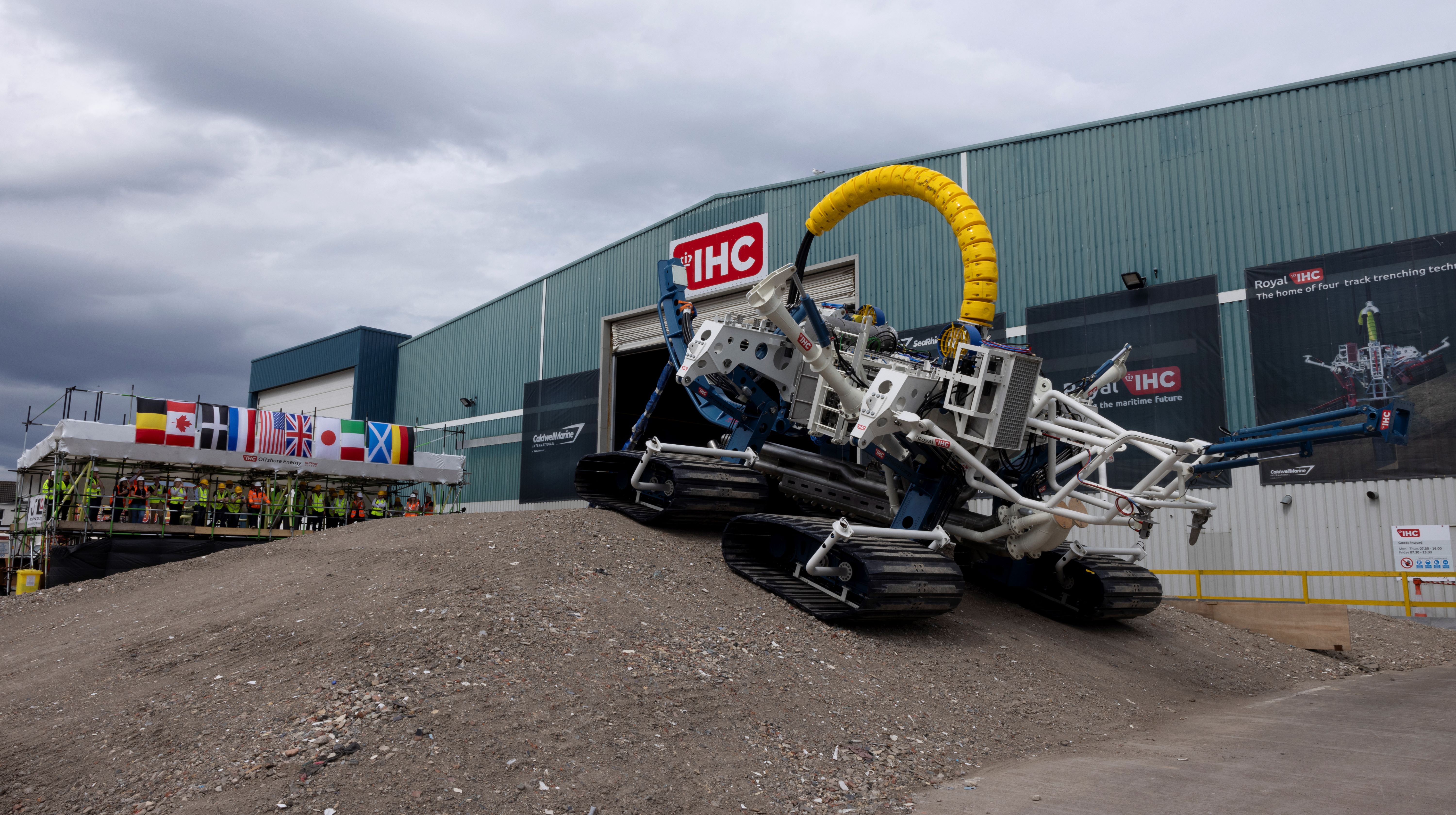 Amphibious Hi-Traq Jetter driving off the ramp