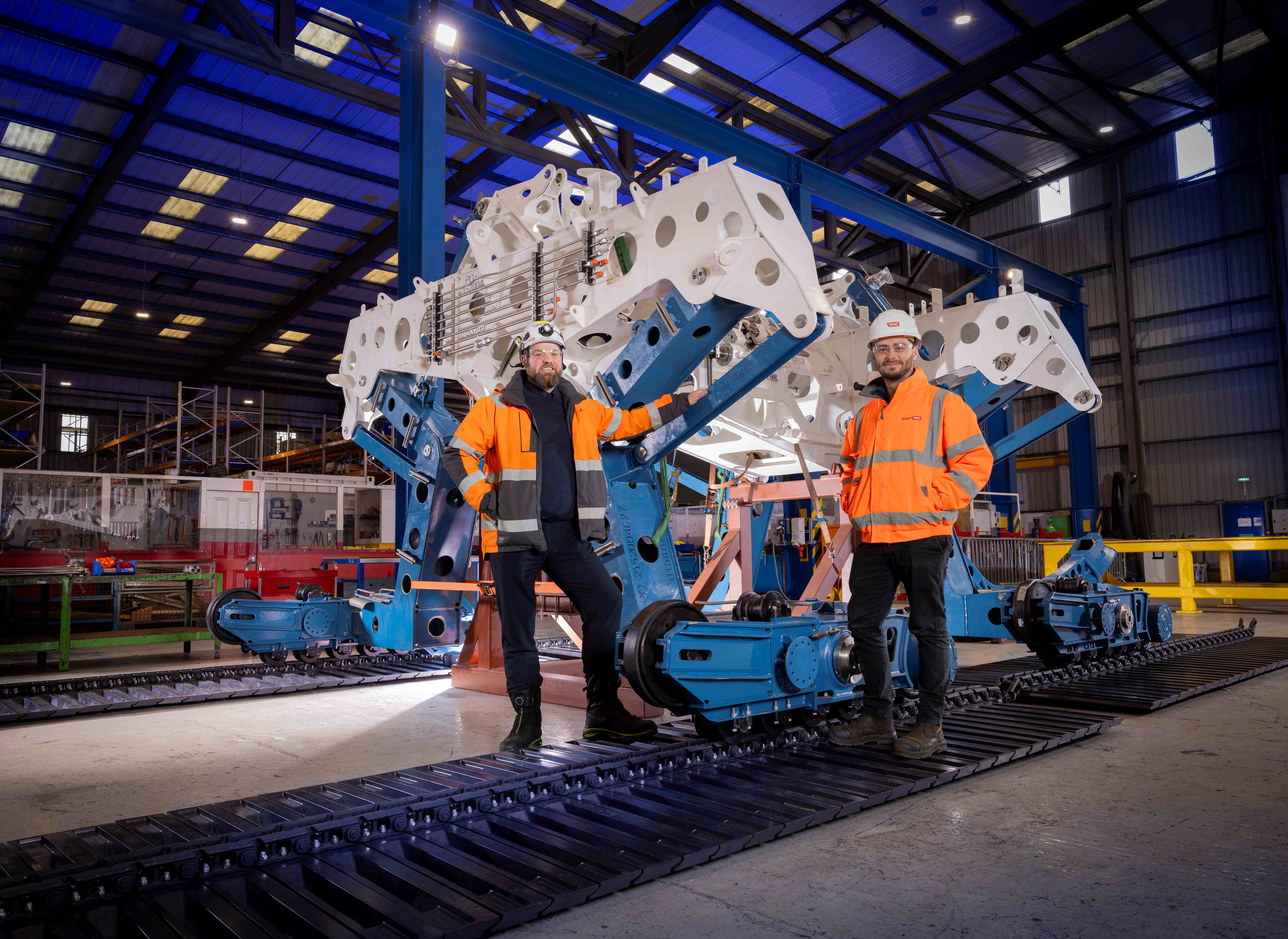 Royal IHC colleagues next to the Hi-Traq Jetter being constructed