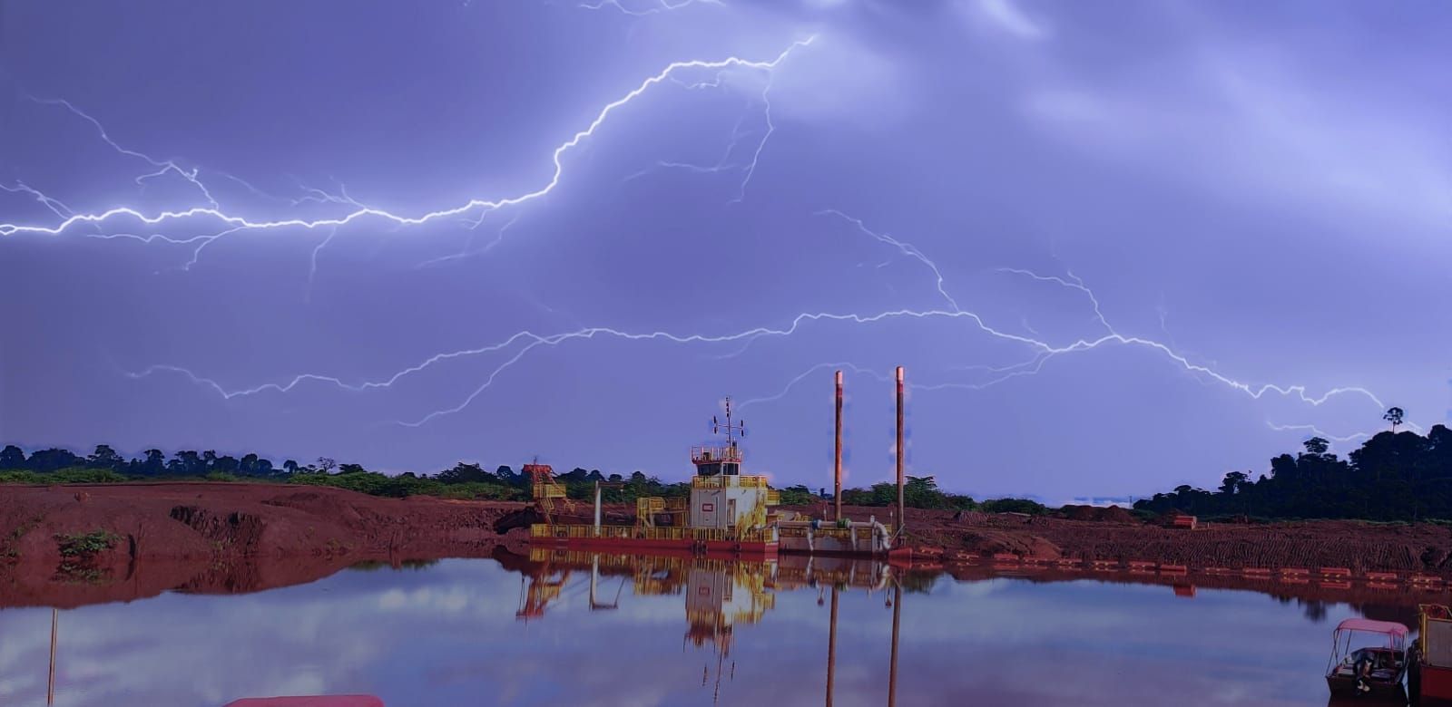Electrical dredger being lit up Electrical dredger being lit up